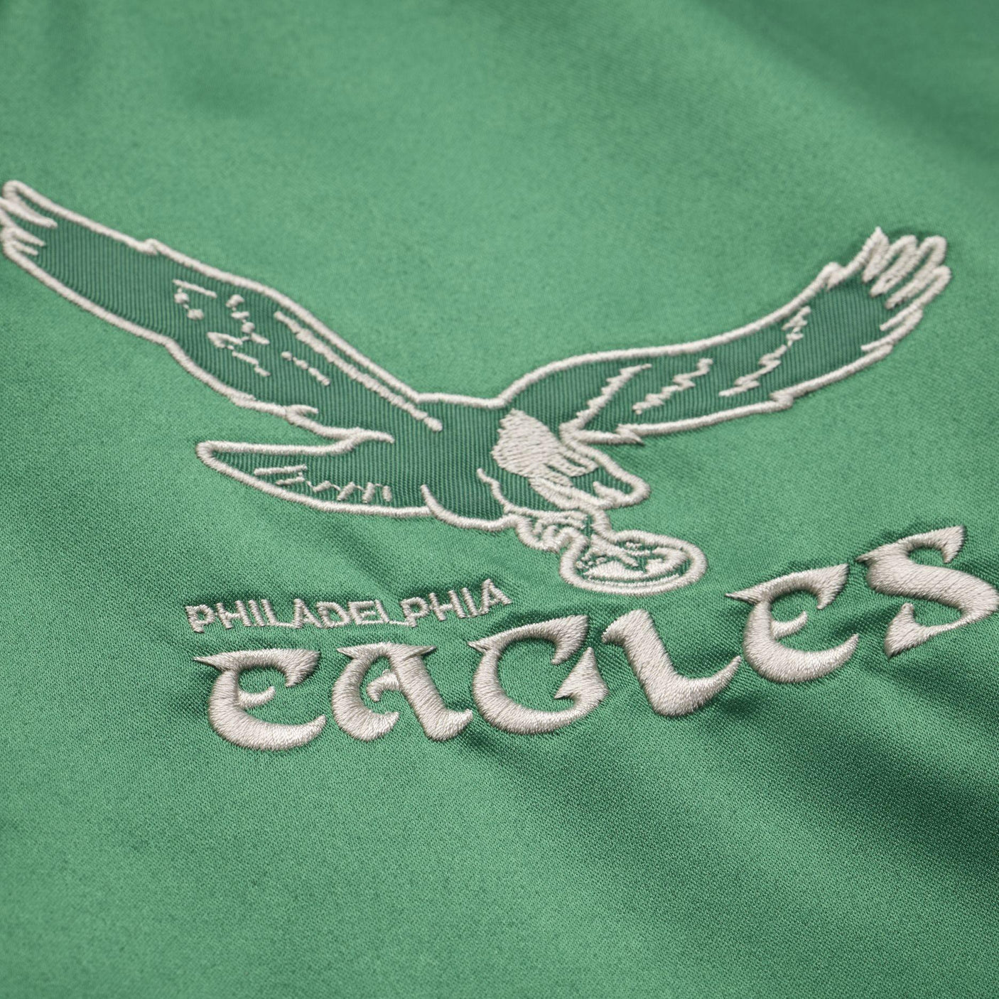 Eagles 2026 Mitchell & Ness Men's NFL Retro Roots Lightweight Satin Jacket (10355338969364)